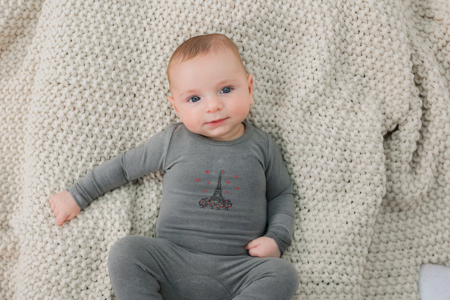 Eiffel Tower Print Baby Onesie in Cream | French-Inspired Bodysuit